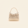 Pearl and silver beaded mini handbag clean hero cream background