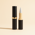 White pearl gel eyeliner stick with black gold packaging clean cream background